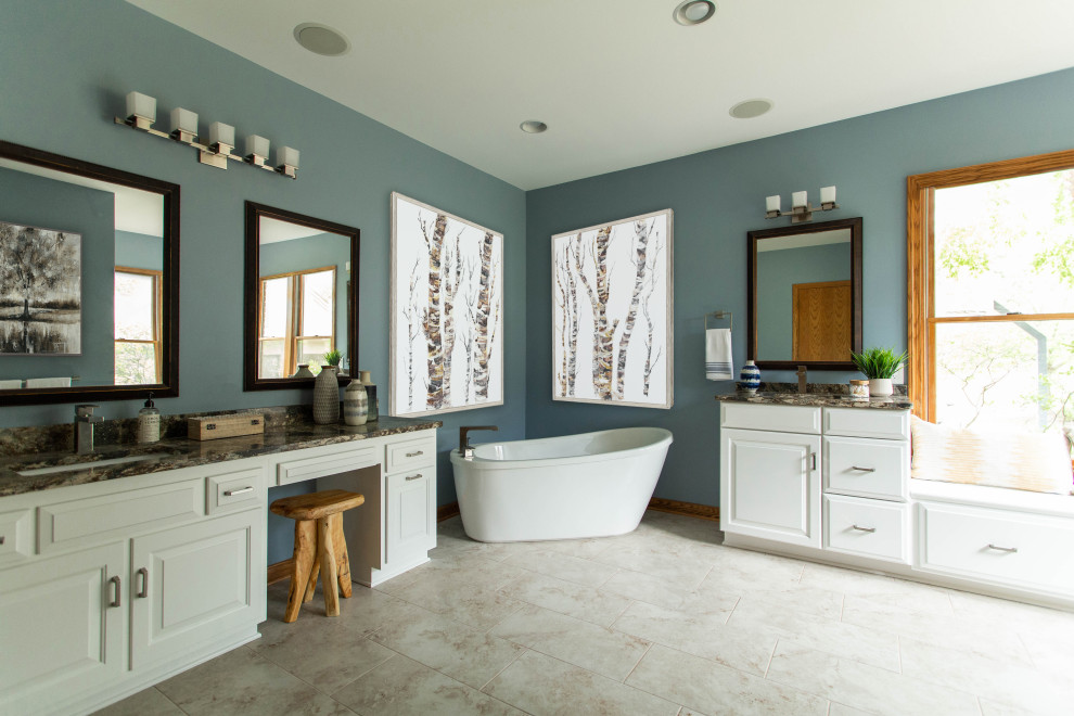 Example of a mountain style master ceramic tile, beige floor and double-sink bathroom design in Cleveland with recessed-panel cabinets, white cabinets, blue walls, an undermount sink, quartz countertops, brown countertops and a built-in vanity