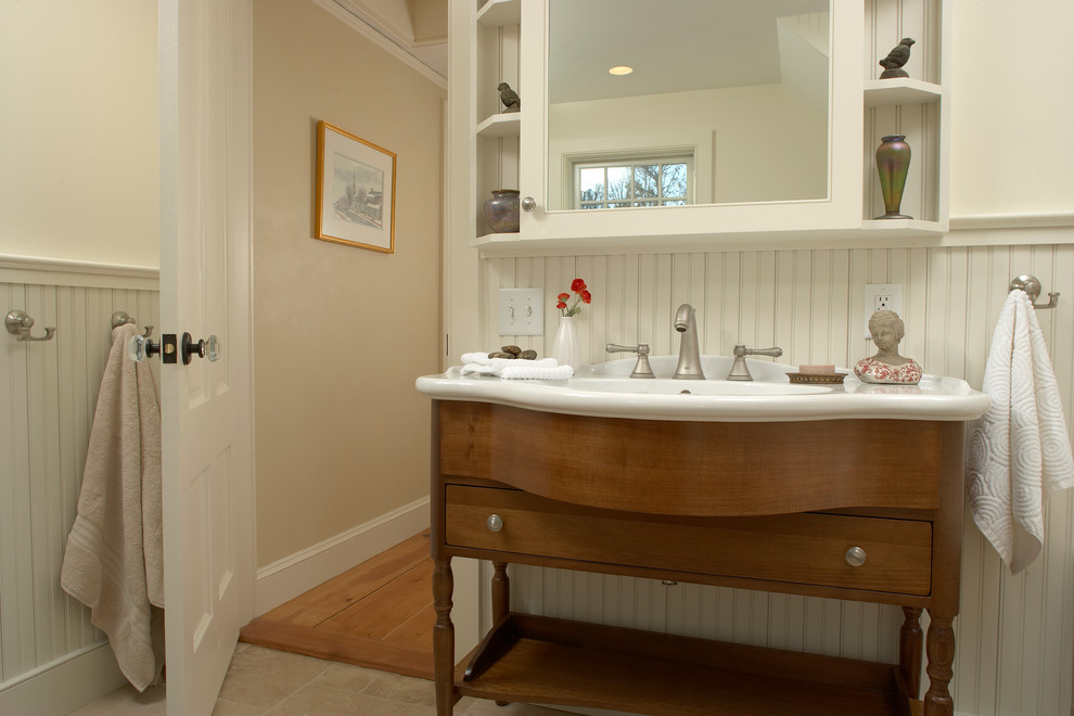 Example of a large classic master stone tile ceramic tile alcove bathtub design in San Francisco with medium tone wood cabinets, a two-piece toilet and flat-panel cabinets
