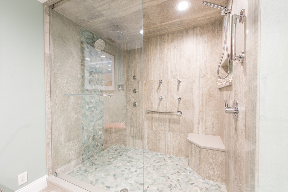 Alcove shower - mid-sized contemporary master beige tile and pebble tile porcelain tile alcove shower idea in Other with shaker cabinets, dark wood cabinets, a two-piece toilet, green walls, an undermount sink, quartz countertops and a hinged shower door