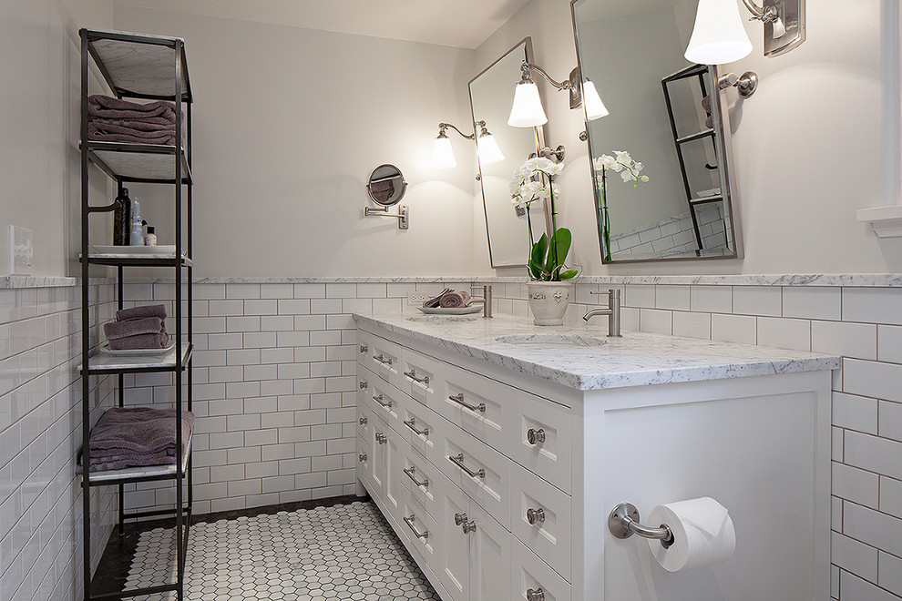 Mid-sized elegant master white tile and ceramic tile marble floor alcove shower photo in Seattle with an undermount sink, shaker cabinets, white cabinets, marble countertops, a one-piece toilet and gray walls