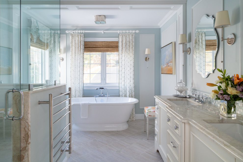 Inspiration for a mid-sized coastal master ceramic tile ceramic tile and beige floor bathroom remodel in Boston with furniture-like cabinets, white cabinets, a one-piece toilet, blue walls, an undermount sink, quartzite countertops, a hinged shower door and multicolored countertops