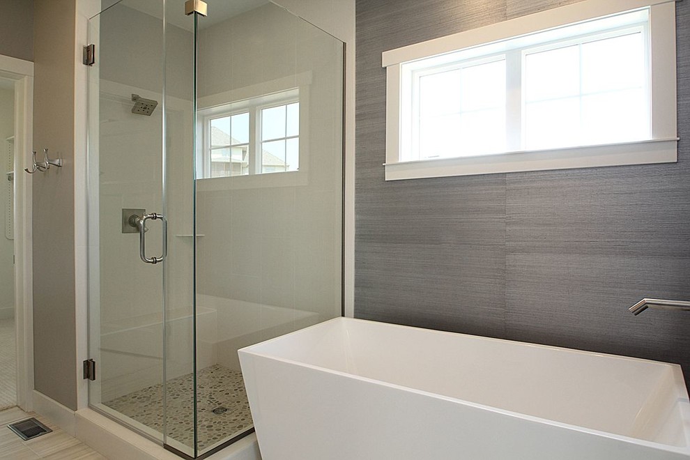 Inspiration for a mid-sized modern master gray tile and stone tile ceramic tile walk-in shower remodel in Cedar Rapids with an undermount sink, shaker cabinets, white cabinets, quartz countertops and gray walls