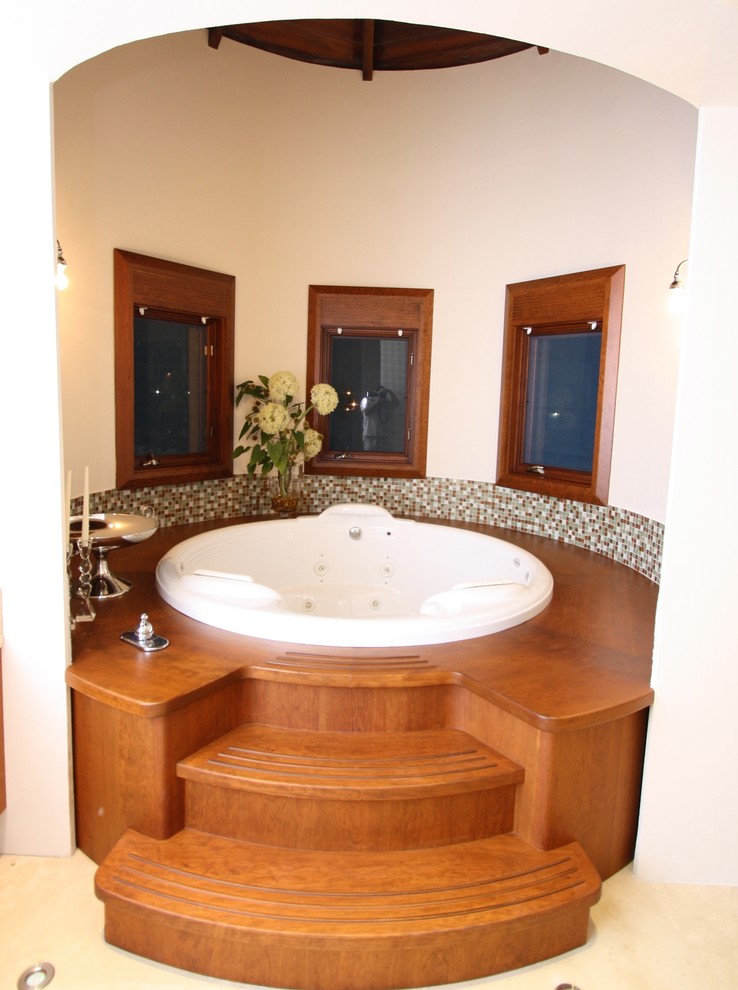Example of an island style bathroom design in Miami