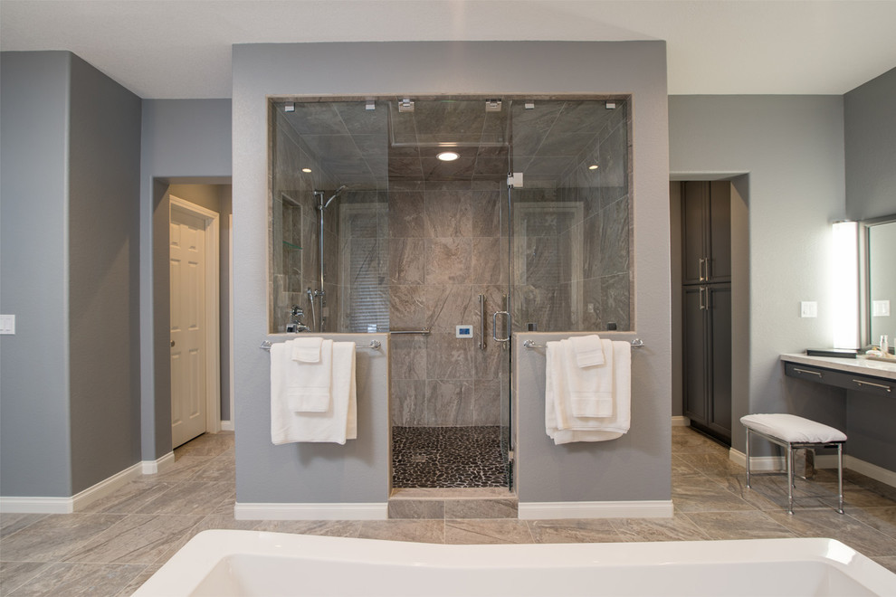 Bathroom - huge modern master beige tile and stone tile marble floor bathroom idea in San Diego with an undermount sink, recessed-panel cabinets, gray cabinets, quartz countertops, a one-piece toilet and gray walls