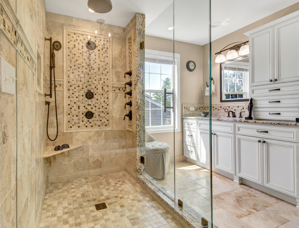 Inspiration for a timeless beige tile beige floor corner shower remodel in Chicago with recessed-panel cabinets, white cabinets, beige walls and a hinged shower door