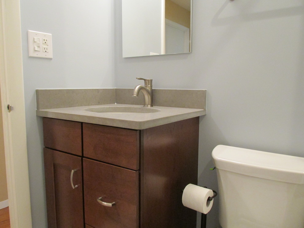 Design ideas for a small classic shower room bathroom in DC Metro with raised-panel cabinets, dark wood cabinets, a submerged sink and grey walls.