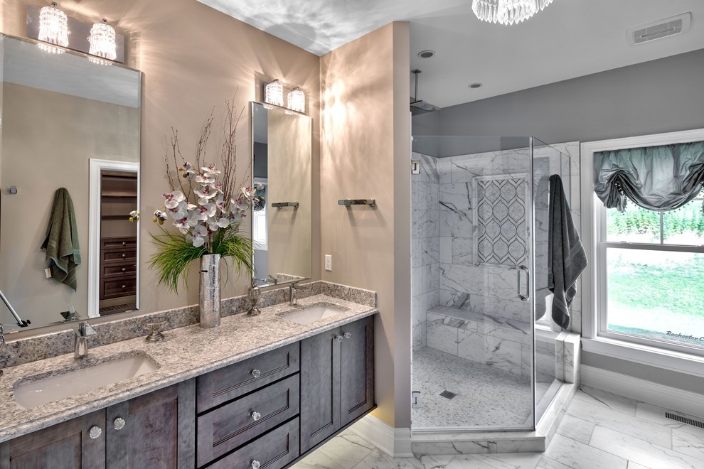 Design ideas for a large traditional ensuite bathroom in New York with shaker cabinets, distressed cabinets, a corner shower, grey tiles, white tiles, marble tiles, grey walls, marble flooring, a submerged sink, granite worktops, white floors and a hinged door.
