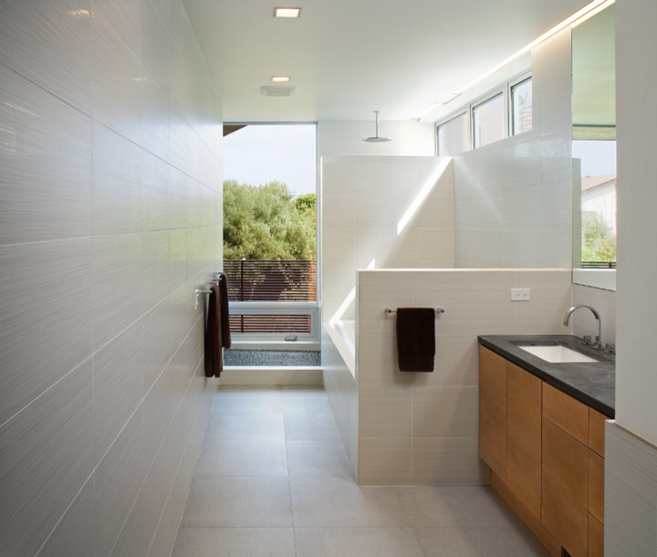 Inspiration for a large contemporary master white tile bathroom remodel in San Diego with flat-panel cabinets, light wood cabinets and white walls