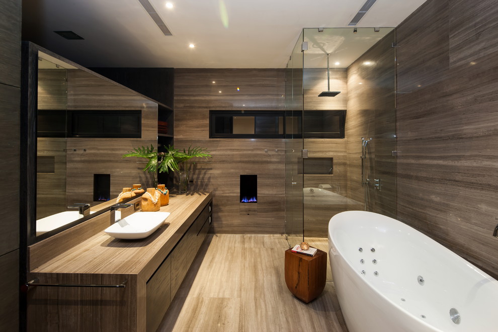 Trendy beige floor freestanding bathtub photo in Other