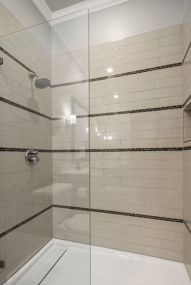 Photo of a medium sized traditional shower room bathroom in Dallas with shaker cabinets, dark wood cabinets, a built-in shower, a one-piece toilet, beige tiles, ceramic tiles, grey walls, porcelain flooring, a submerged sink and solid surface worktops.