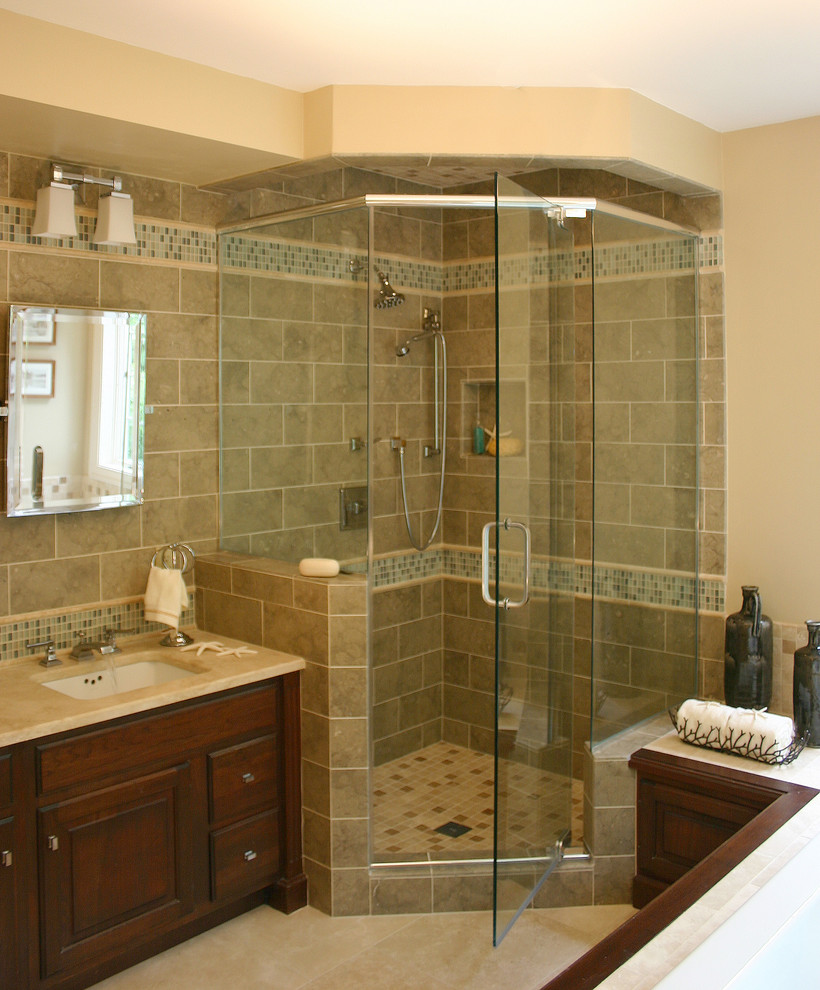 Photo of a classic bathroom in Boston with a corner shower and mosaic tiles.
