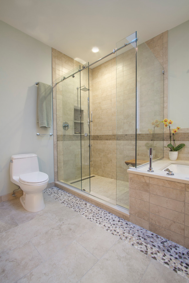 Idée de décoration pour une salle de bain principale design en bois brun de taille moyenne avec un placard avec porte à panneau encastré, une baignoire posée et un lavabo encastré.