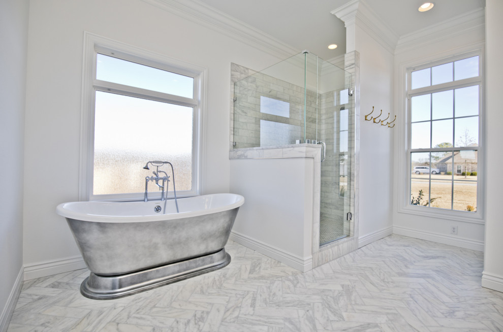 Inspiration for a large timeless master gray tile and marble tile marble floor and gray floor bathroom remodel in Other with raised-panel cabinets, gray cabinets, white walls, an undermount sink, marble countertops, gray countertops and a hinged shower door