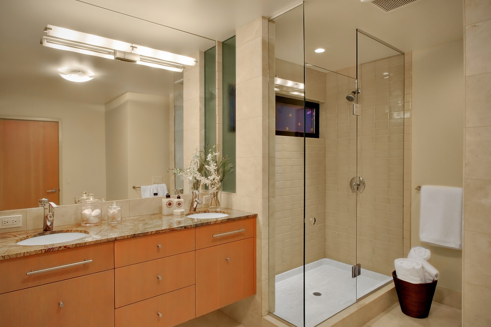 Photo of a contemporary bathroom in Seattle with a corner shower and beige tiles.