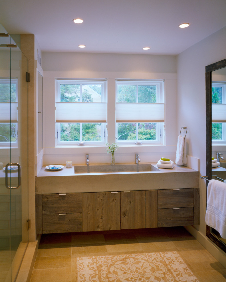 Пример оригинального дизайна: ванная комната в морском стиле с раковиной с несколькими смесителями, плоскими фасадами, столешницей из бетона, душем в нише и белыми стенами