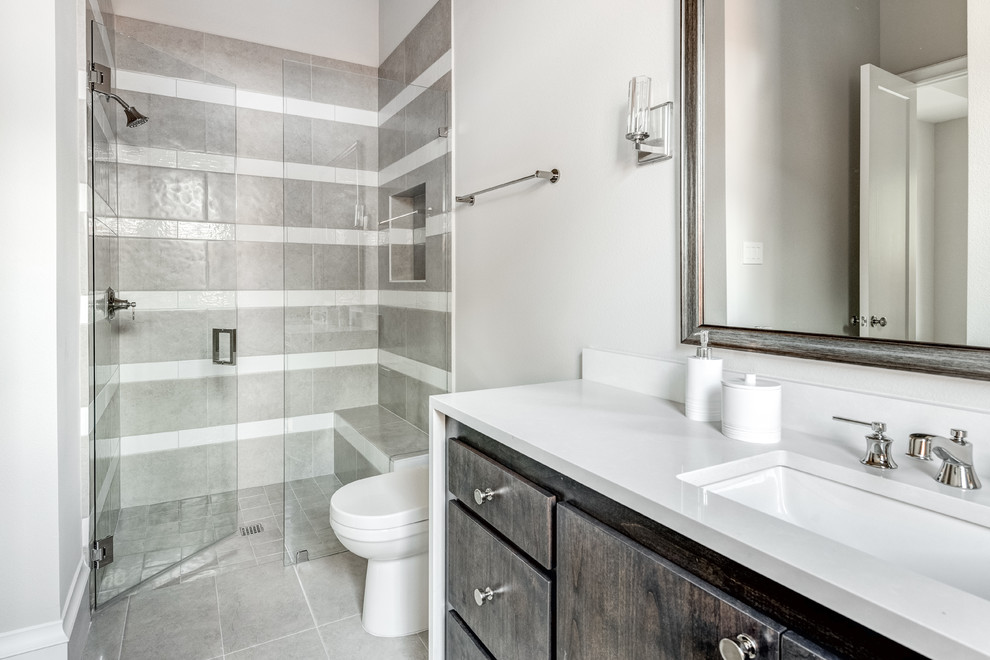 Large tuscan master gray tile and porcelain tile porcelain tile and gray floor doorless shower photo in Dallas with shaker cabinets, white cabinets, a two-piece toilet, white walls, an undermount sink, quartz countertops, a hinged shower door and white countertops