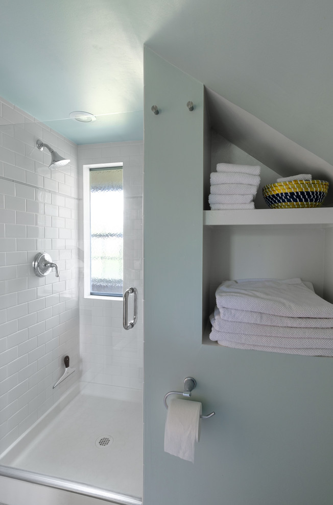 Inspiration for a medium sized midcentury shower room bathroom in Baltimore with flat-panel cabinets, white cabinets, green walls, ceramic flooring, white floors, a hinged door, white tiles, porcelain tiles and a built-in sink.