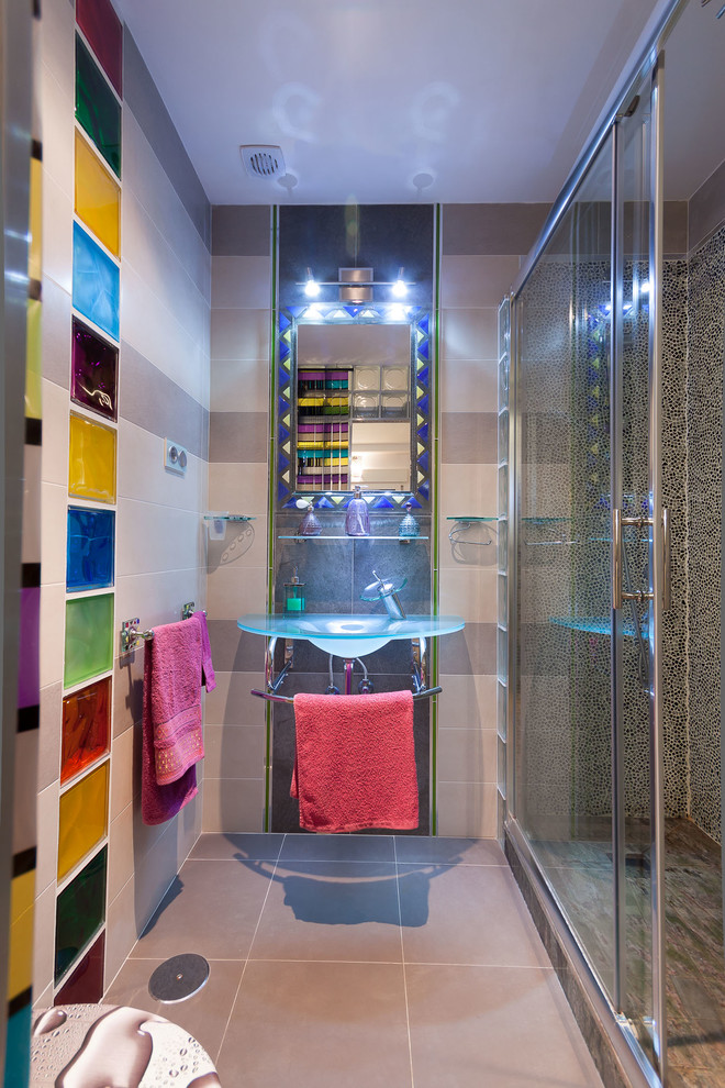 Example of a mid-sized eclectic kids' multicolored tile and glass tile ceramic tile alcove shower design in Malaga with a wall-mount sink and gray walls