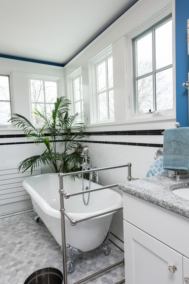 Bathroom - coastal bathroom idea in Atlanta with yellow walls