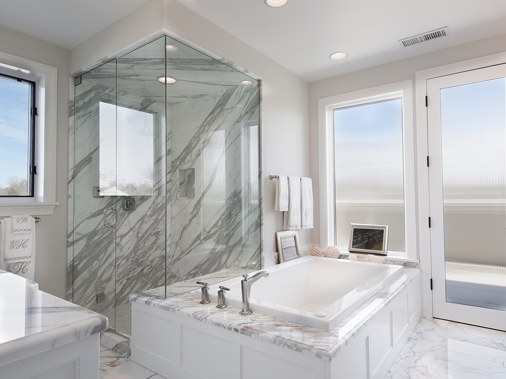 Classic bathroom in Denver with a built-in bath, a corner shower and white tiles.