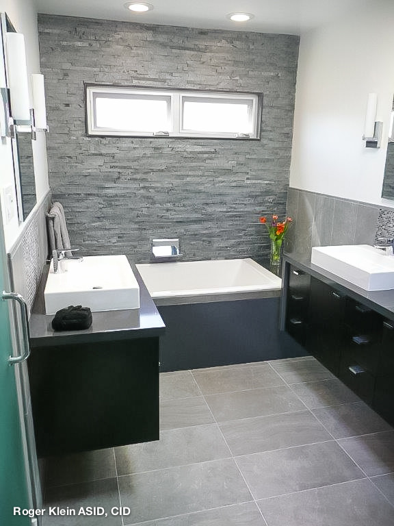 Example of a mid-sized minimalist master gray tile and porcelain tile porcelain tile bathroom design in Los Angeles with a drop-in sink, dark wood cabinets, quartz countertops, a one-piece toilet and white walls