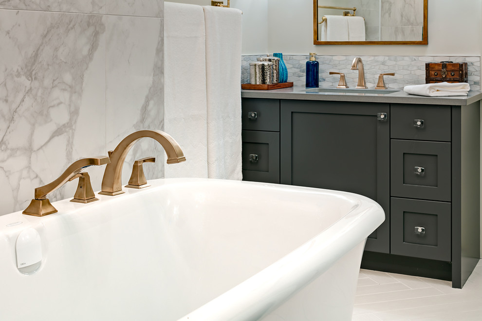 Champagne bronze fixtures throughout Transitional Bathroom