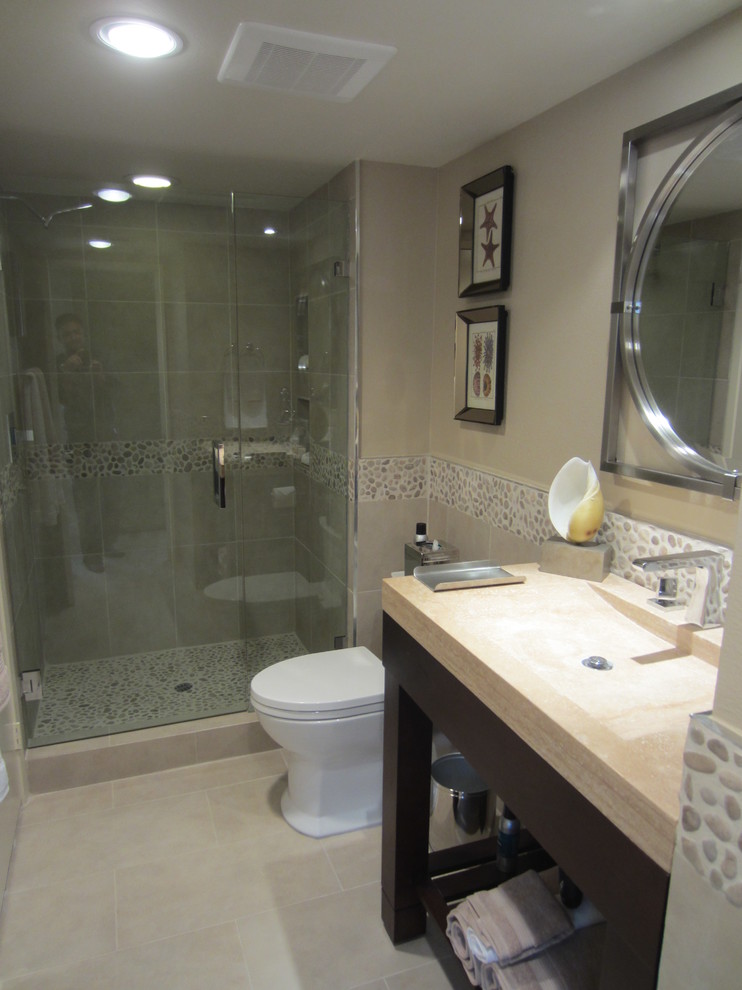 Small contemporary shower room bathroom in Los Angeles with a console sink, open cabinets, dark wood cabinets, granite worktops, a walk-in shower, a one-piece toilet, beige tiles, porcelain tiles, beige walls and porcelain flooring.