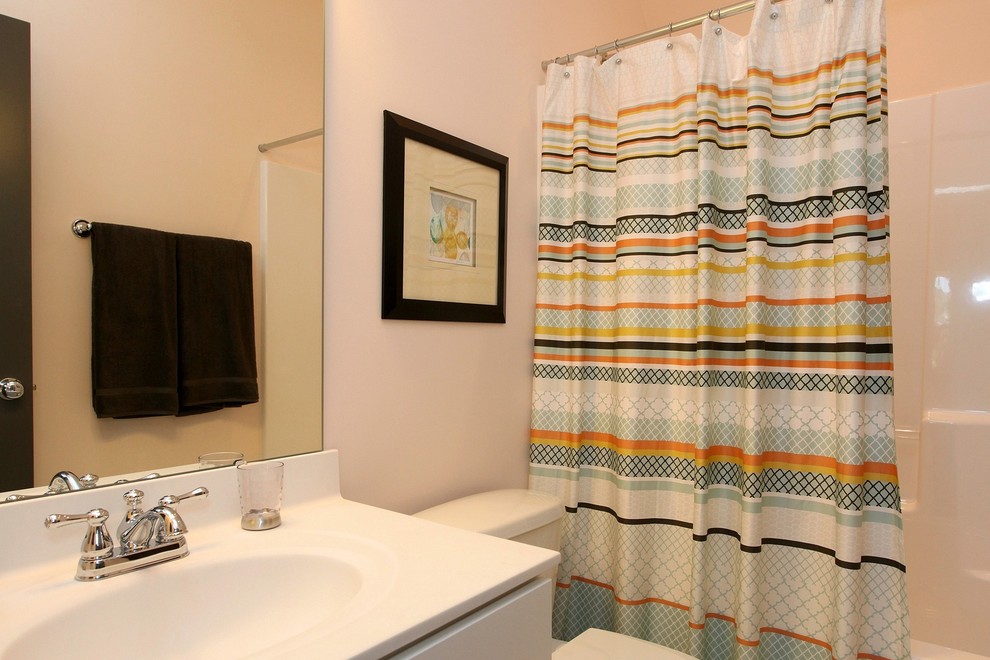 Example of an arts and crafts bathroom design in Raleigh