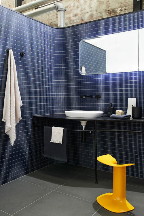 Blue Bathroom Ideas: Black Vanity and a Pop of Yellow with a Stool