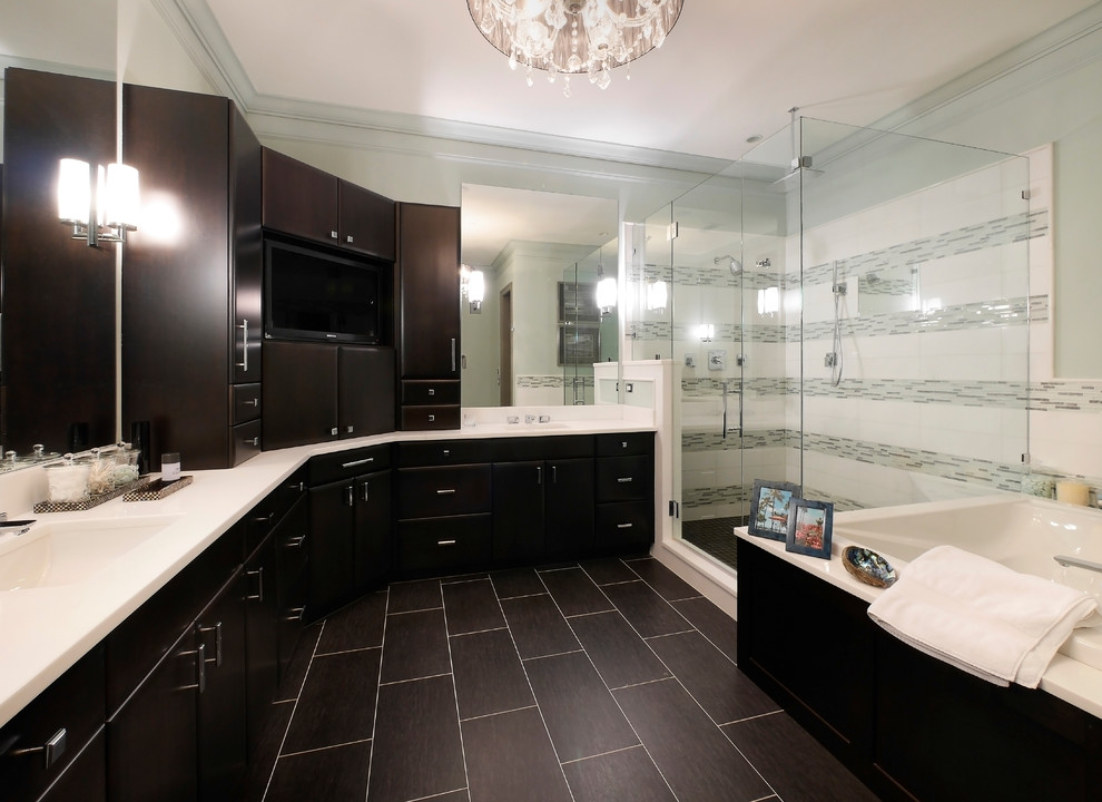 Bathroom - large transitional master gray tile, white tile and matchstick tile porcelain tile and blue floor bathroom idea in Charlotte with flat-panel cabinets, black cabinets, blue walls, an undermount sink, quartzite countertops and a hinged shower door