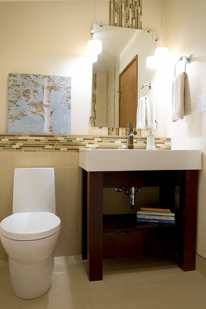 Photo of a small contemporary shower room bathroom in Calgary with a console sink, open cabinets, dark wood cabinets, an alcove bath, a shower/bath combination, a one-piece toilet, multi-coloured tiles, mosaic tiles, beige walls and porcelain flooring.