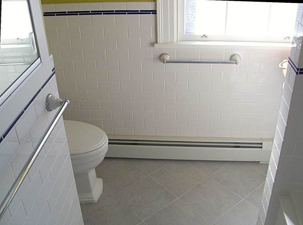 Mid-sized elegant master white tile and subway tile ceramic tile bathroom photo in Providence with white cabinets, marble countertops, a two-piece toilet, yellow walls, beaded inset cabinets and an undermount sink