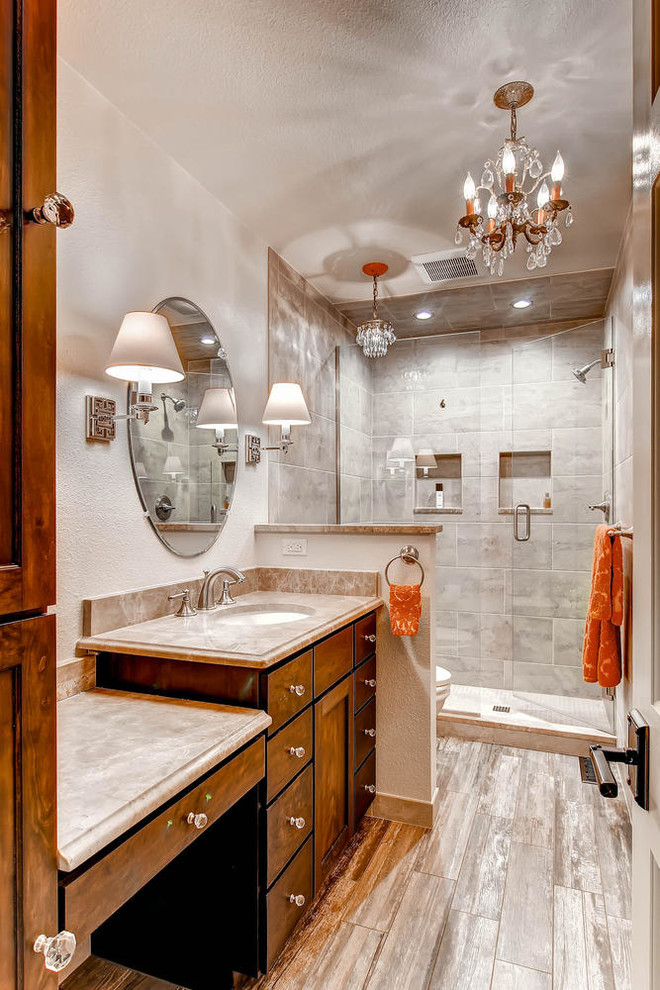 Mid-sized transitional master beige tile and ceramic tile ceramic tile alcove shower photo in Denver with an undermount sink, flat-panel cabinets, medium tone wood cabinets, a two-piece toilet and beige walls