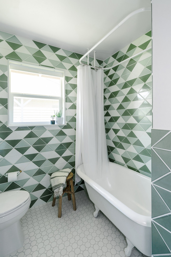This is an example of a classic ensuite bathroom in Austin with multi-coloured tiles, ceramic tiles and multi-coloured walls.