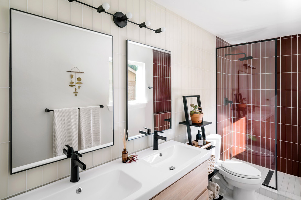 Modern bathroom in San Francisco with red walls, ceramic flooring and white floors.