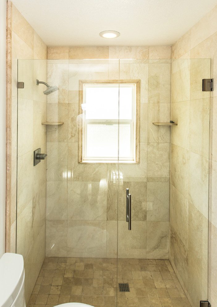 Mid-sized trendy master beige tile and stone tile travertine floor doorless shower photo in Orlando with an undermount sink, flat-panel cabinets, dark wood cabinets and quartz countertops