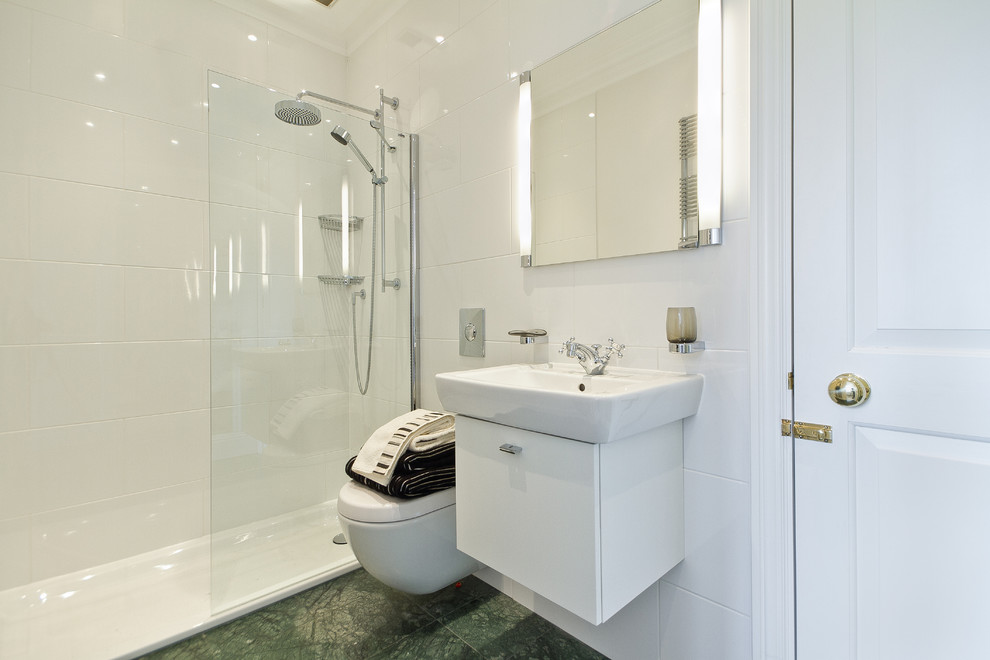 Contemporary bathroom in London with a wall mounted toilet.