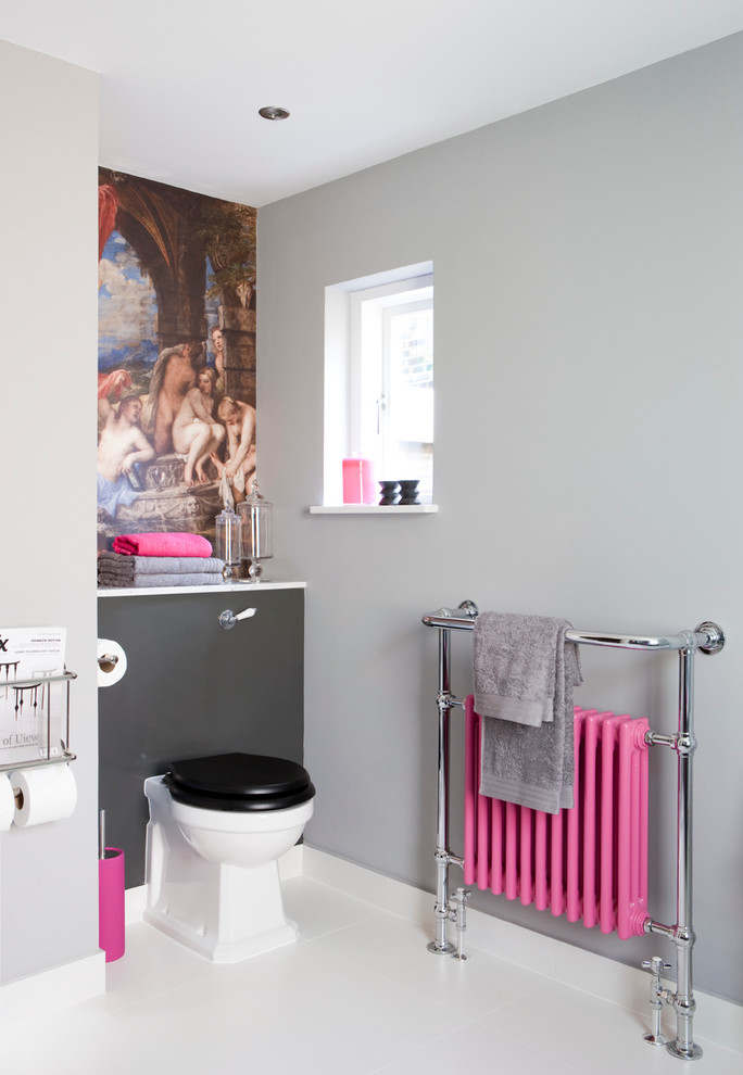 Transitional ceramic tile bathroom photo in London with a one-piece toilet and gray walls