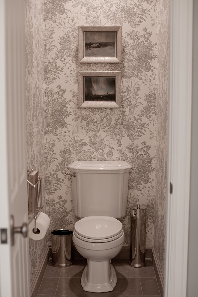Photo of a large classic cloakroom in Other with a submerged sink, raised-panel cabinets, distressed cabinets, limestone worktops, a two-piece toilet, beige tiles, stone tiles, blue walls and mosaic tile flooring.