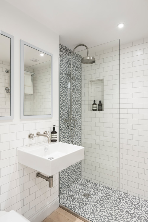 Black and White Cement Shower Tiles with Chrome Fixtures