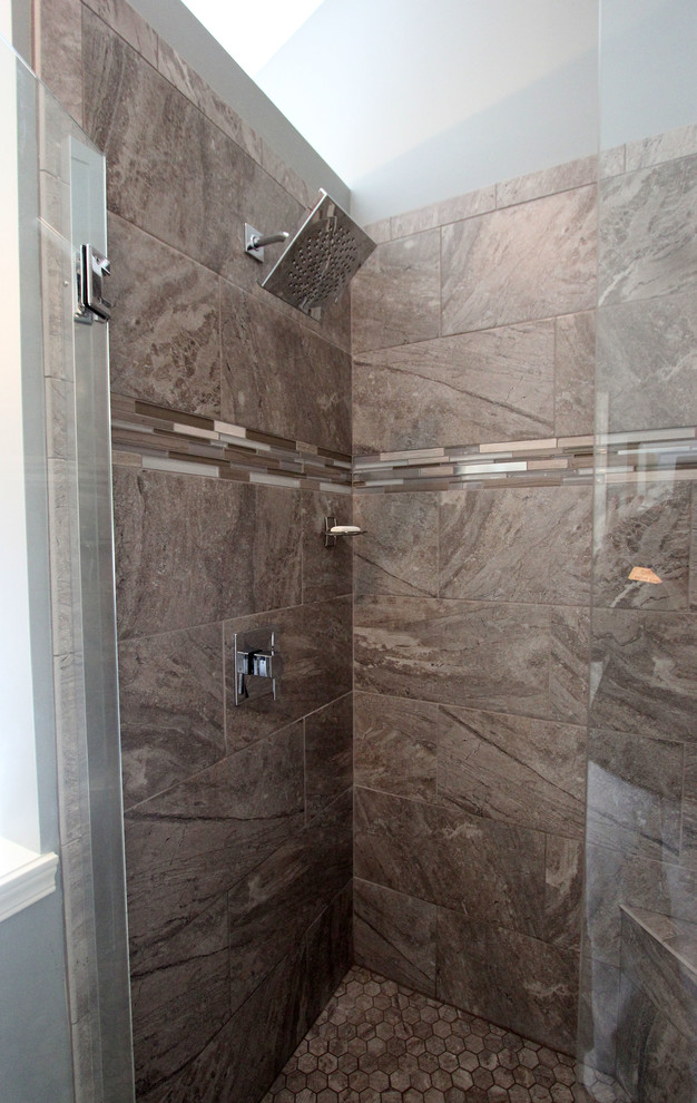 Photo of a medium sized traditional ensuite bathroom in Cleveland with flat-panel cabinets, black cabinets, a corner shower, green tiles, porcelain tiles, porcelain flooring, a submerged sink, engineered stone worktops, grey floors and a hinged door.