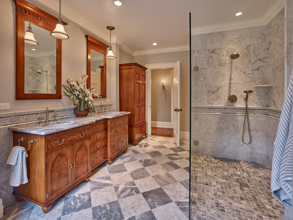 Bathroom - mid-sized traditional master gray tile and marble tile marble floor and multicolored floor bathroom idea in Other with furniture-like cabinets, dark wood cabinets, a two-piece toilet, gray walls, an undermount sink, marble countertops and white countertops