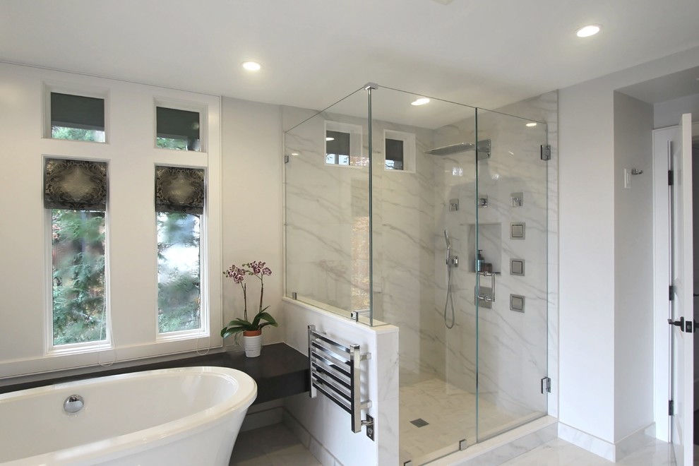 Inspiration for a large traditional ensuite bathroom in Boston with a vessel sink, flat-panel cabinets, dark wood cabinets, engineered stone worktops, a freestanding bath, a double shower, white tiles, ceramic tiles, white walls and ceramic flooring.