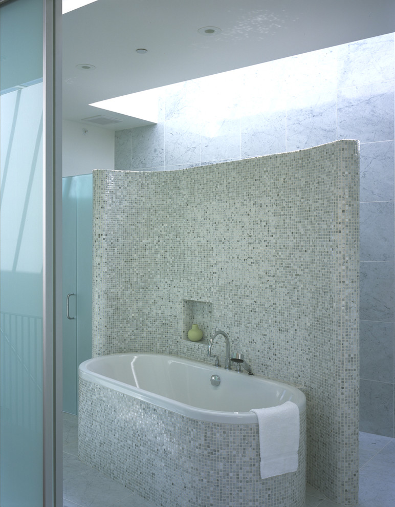 Photo of a contemporary bathroom in San Francisco with mosaic tiles.