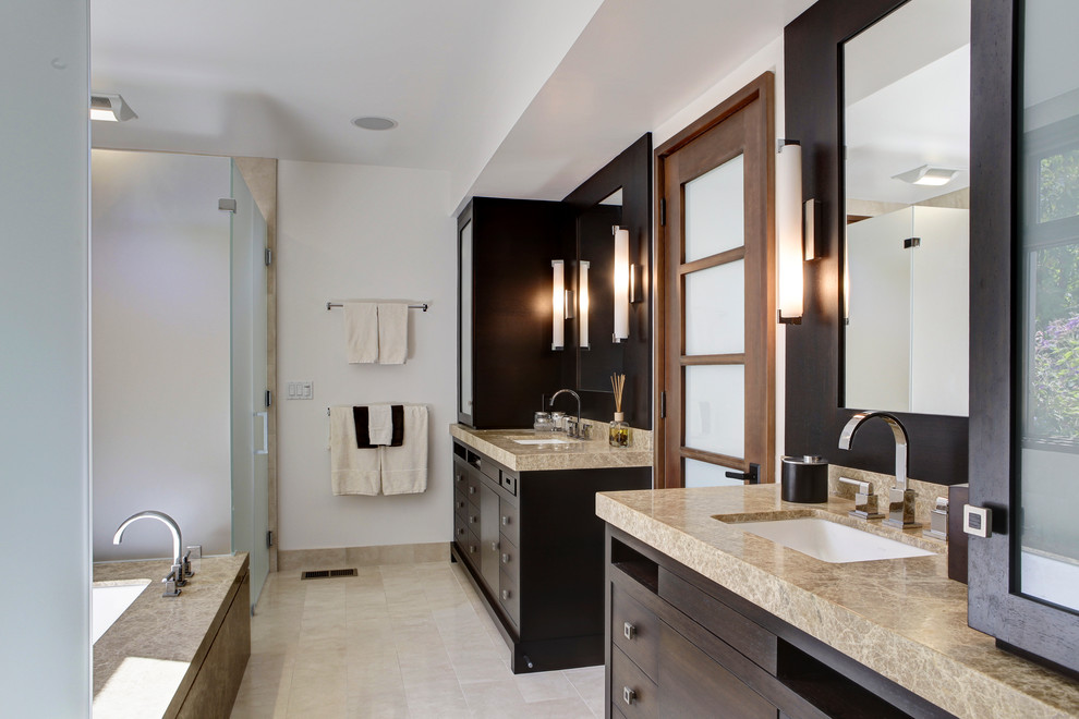 Design ideas for a mid-sized modern master bathroom in San Francisco with a drop-in sink, flat-panel cabinets, dark wood cabinets, a drop-in tub, a corner shower, a two-piece toilet, white walls, porcelain floors, beige floor and brown benchtops.