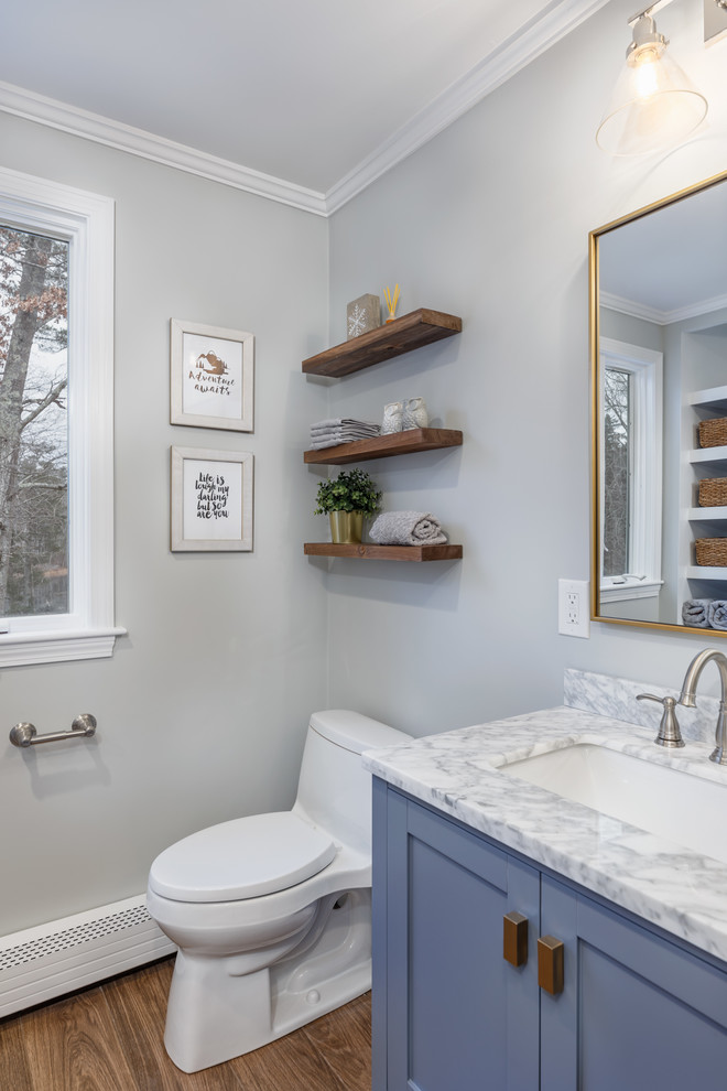 Inspiration for a medium sized classic family bathroom in Boston with shaker cabinets, grey cabinets, an alcove bath, an alcove shower, a one-piece toilet, grey tiles, glass tiles, grey walls, porcelain flooring, a submerged sink, engineered stone worktops, multi-coloured floors, a hinged door and multi-coloured worktops.