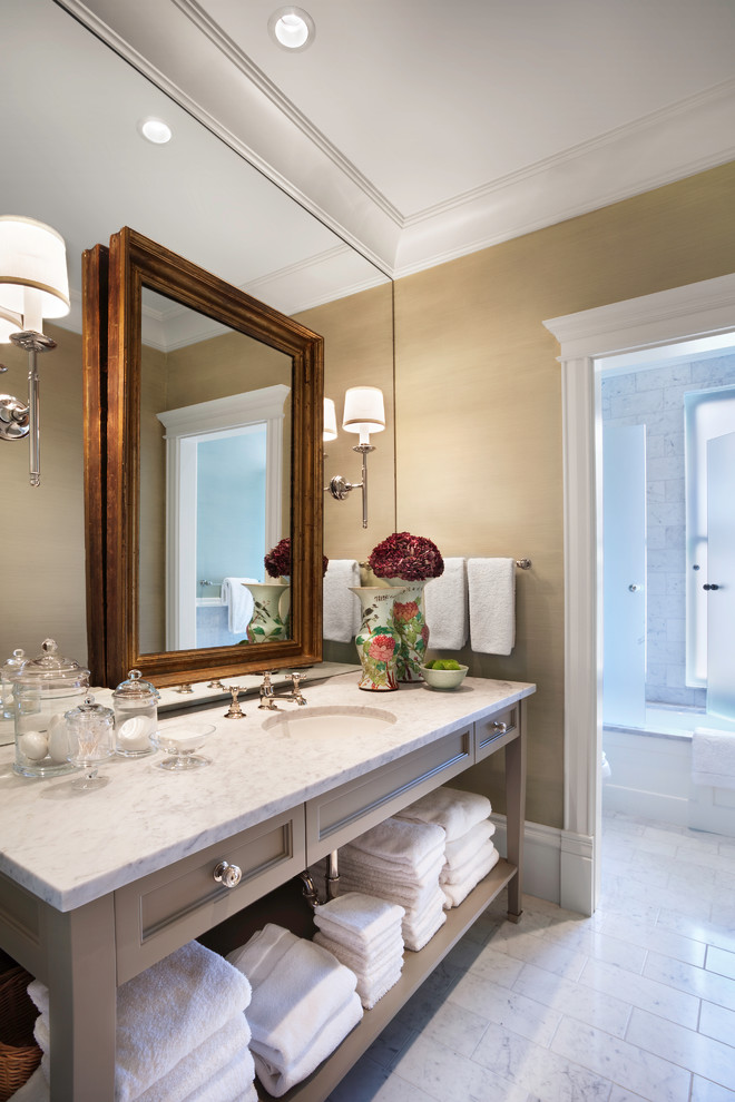 Photo of a traditional bathroom in Chicago with a submerged sink and open cabinets.