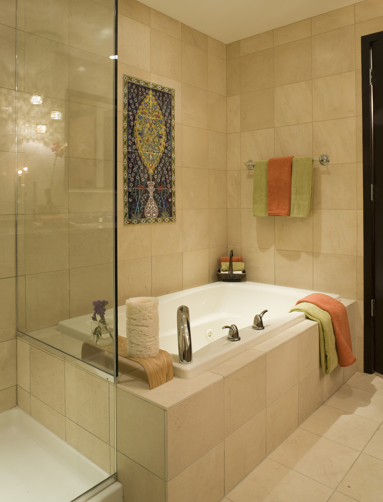 Design ideas for a large traditional ensuite bathroom in Chicago with a submerged sink, flat-panel cabinets, granite worktops, a built-in bath, beige tiles, stone tiles, beige walls, light wood cabinets, a corner shower, a one-piece toilet and marble flooring.