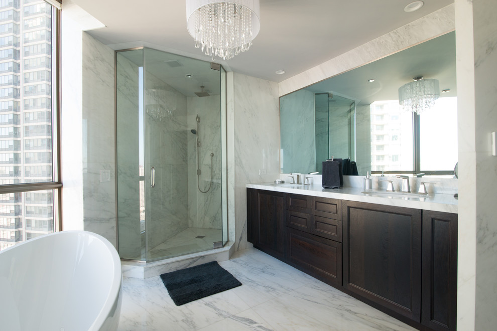 Medium sized contemporary ensuite bathroom in Chicago with marble worktops, flat-panel cabinets, dark wood cabinets, a freestanding bath, an alcove shower, grey walls and a trough sink.
