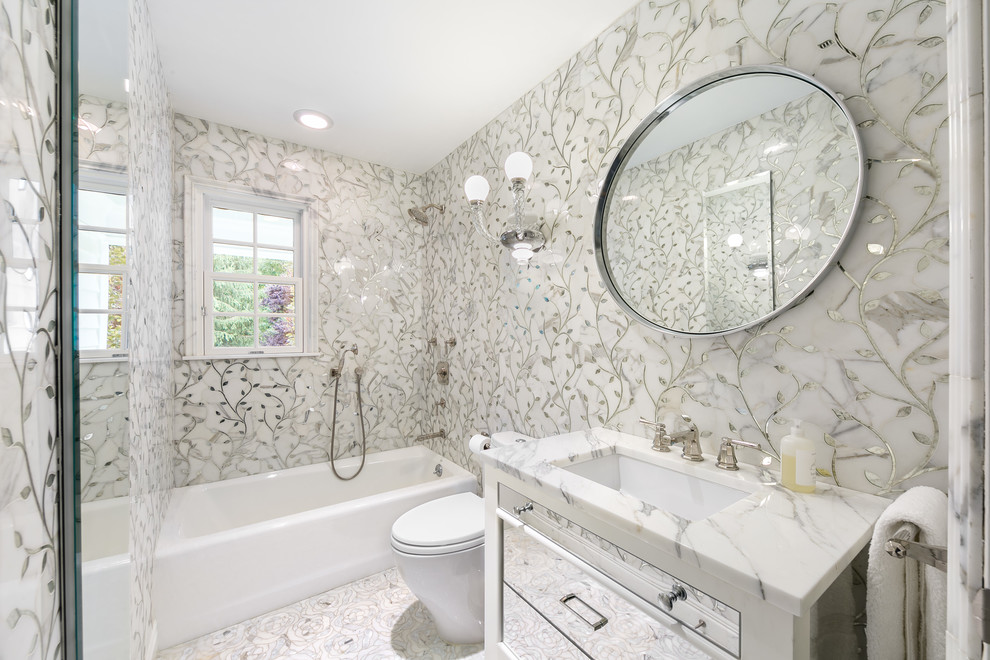 Example of a small minimalist kids' black and white tile and mosaic tile marble floor and white floor bathroom design in New York with recessed-panel cabinets, a two-piece toilet, multicolored walls, a console sink and glass countertops